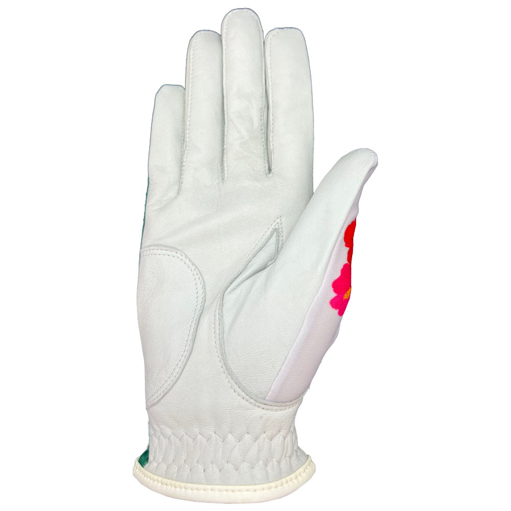 Tropical women's golf glove with white palm. Worn on right hand.