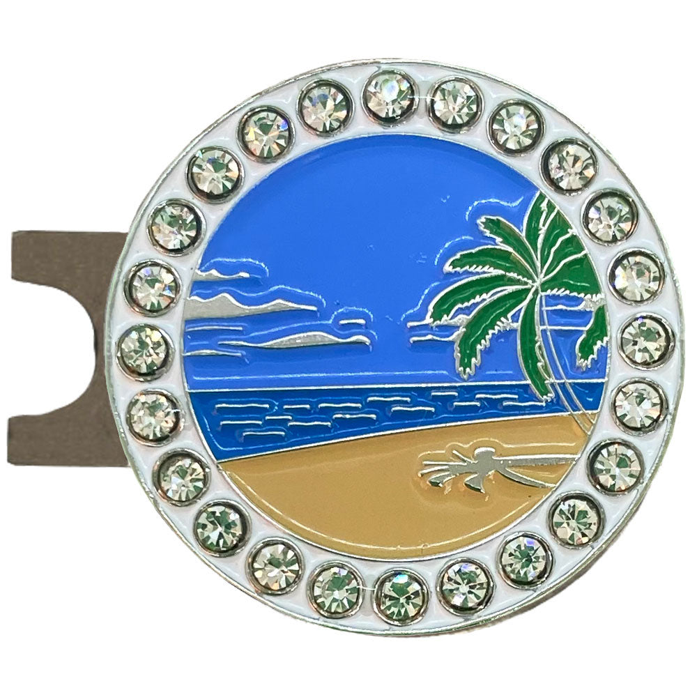 Beautiful Beach Scene golf ball marker with sand, ocean, palm tree, and crystal accents. Colorful design for women golfers.