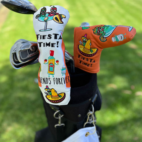 The Giggle Golf Fiesta Utility Cover & Blade Putter Cover on the golf course.