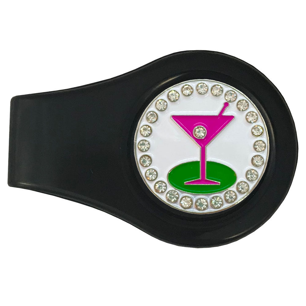 Pink martini glass golf ball marker on black clip, with rhinestone accents, white background, green base, and fun design for lady golfers.