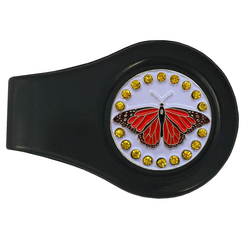 Orange butterfly golf ball marker on a white marker with bling accents. Includes a black clip. Cute design for women golfers