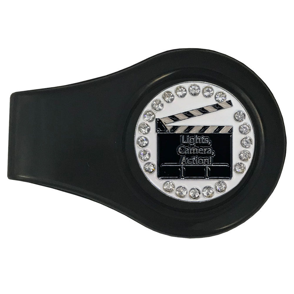 Clapboard golf ball marker on a black clip. White background with crystal accents. A blockbuster design for women golfers