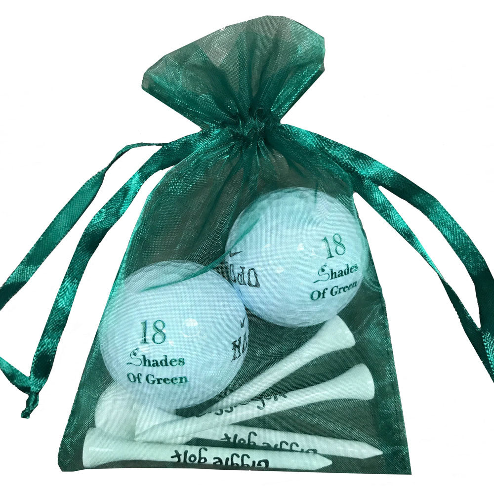 18 shades of green golf ball and tees set. Great for tournaments. Playful gift for women golfers. Cute Packaging. Shop now!