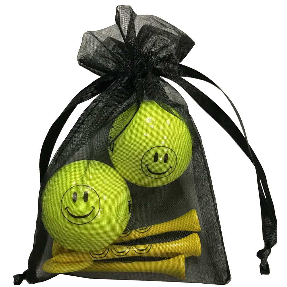 Happy Face golf ball and tees set featuring a cheerful design. Includes 2 golf balls and 4 tees, perfect for golfers. Smile!