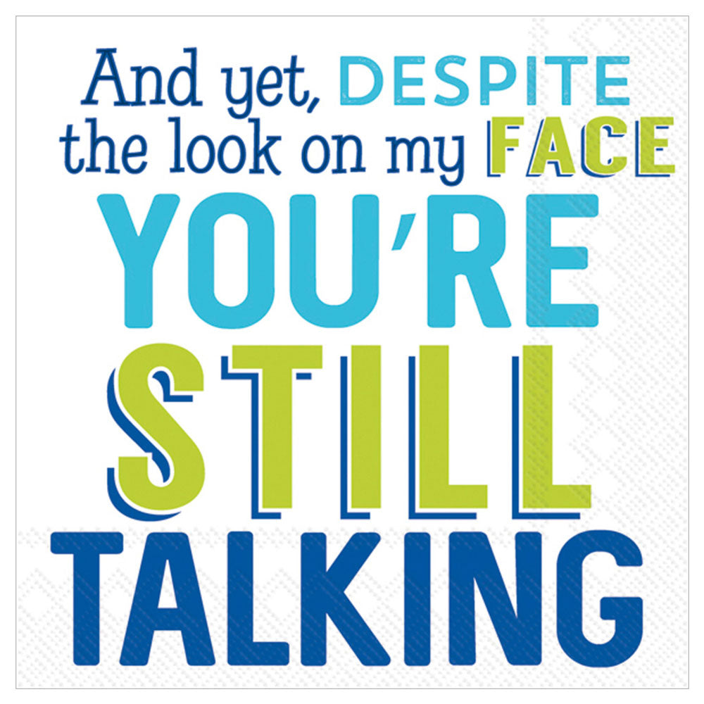 White napkins, blue & green text: “Despite the look on my face you’re still talking” — 20 count of quietly judgmental vibes.