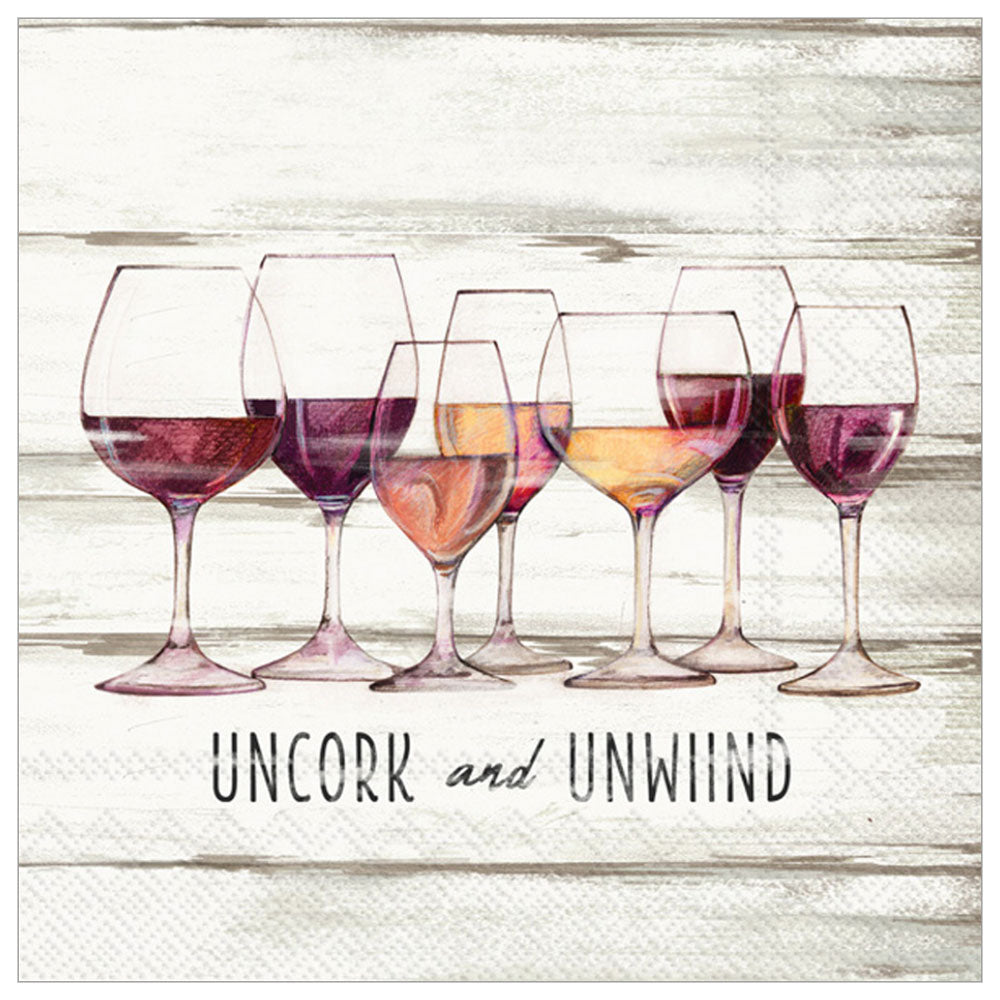 Pack of 20 “Uncork & Unwind” napkins with wine glasses — your drinks finally got a personality. Shop now