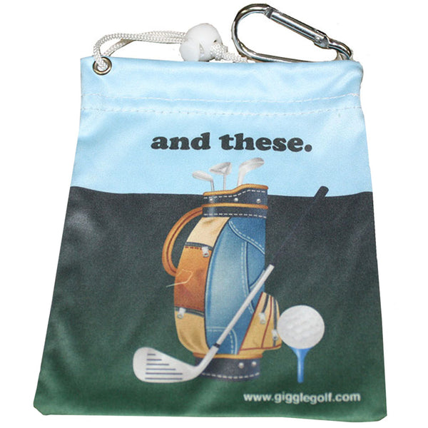 golf bag, clubs, ball and tee clip on tee bag