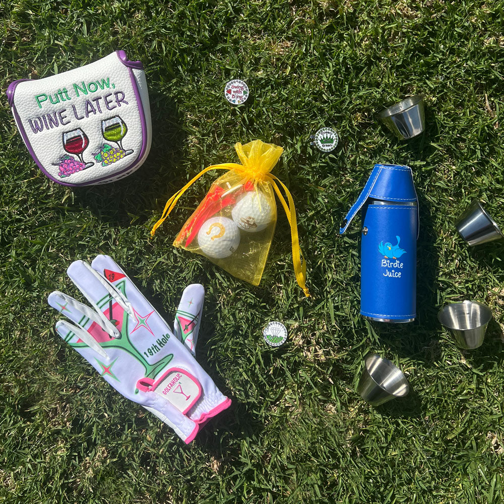 Curated collection of best-selling women's golf accessories including Birdie Juice flasks, fun putter covers, and golf gloves on a grass background.