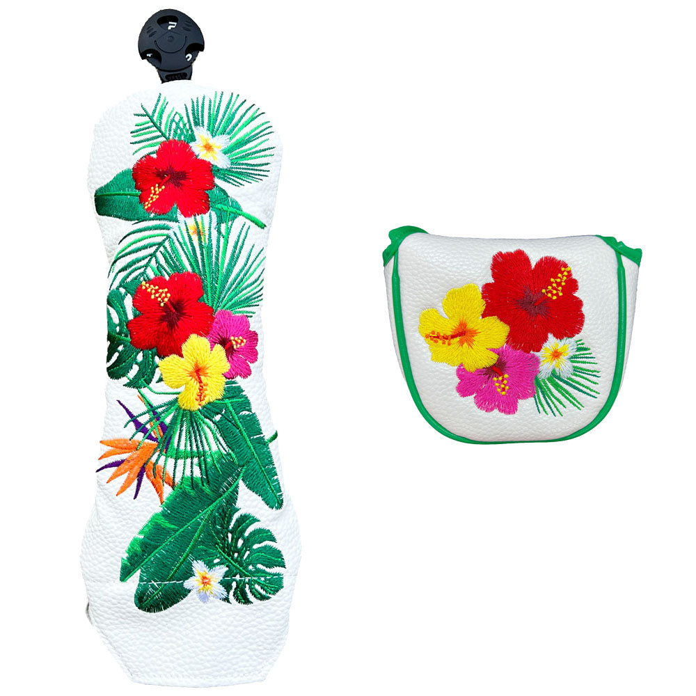 Two  tropical floral-patterned golf club covers (hybrid and mallet) on a white background