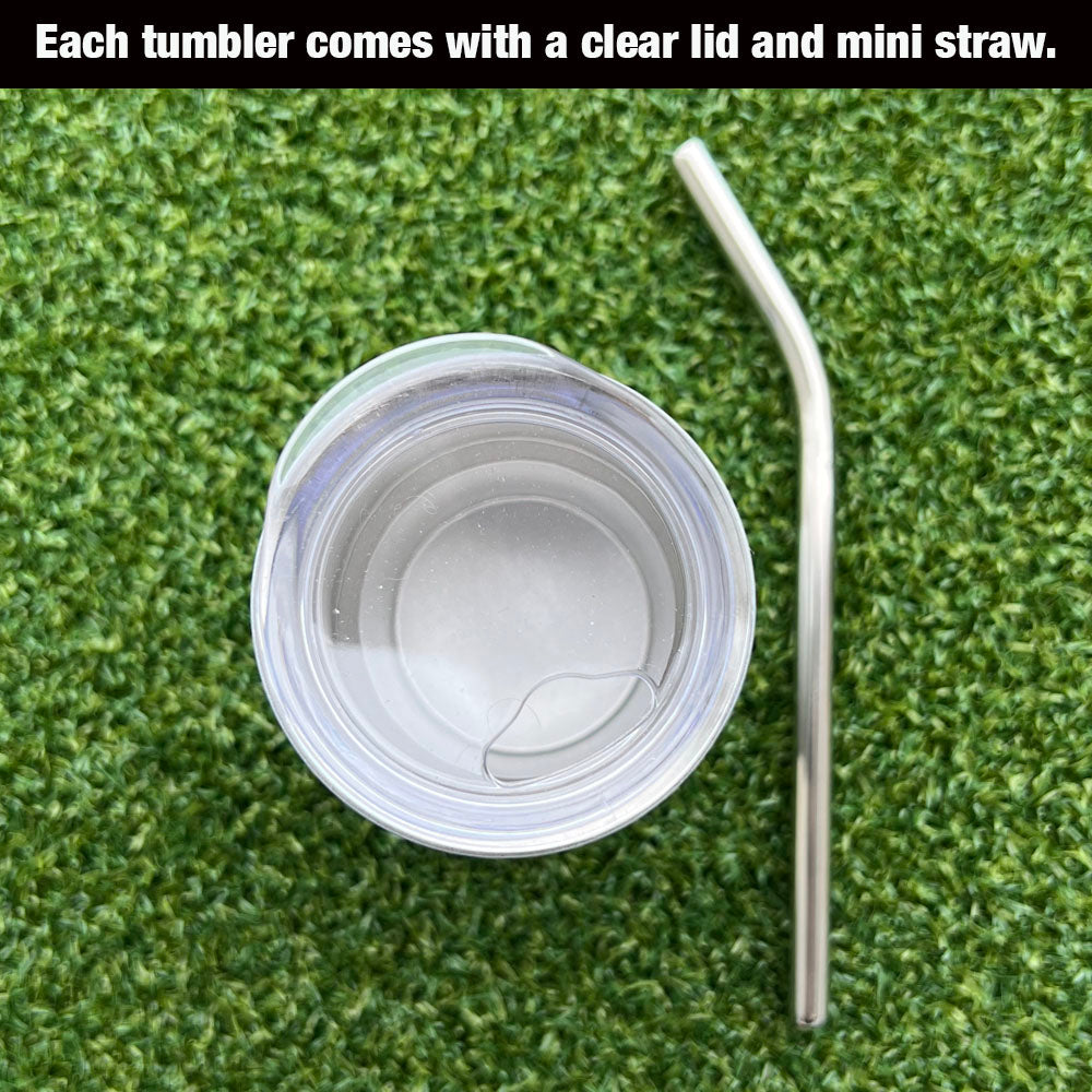 Clear mini tumbler lid and mini straw on green grass