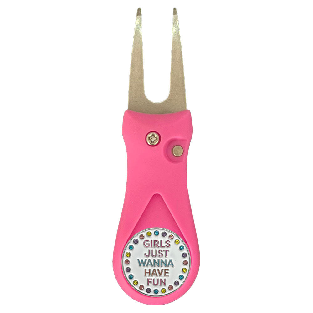 Pink golf divot tool with 'Girls Just Wanna Have Fun' ball marker on a white background