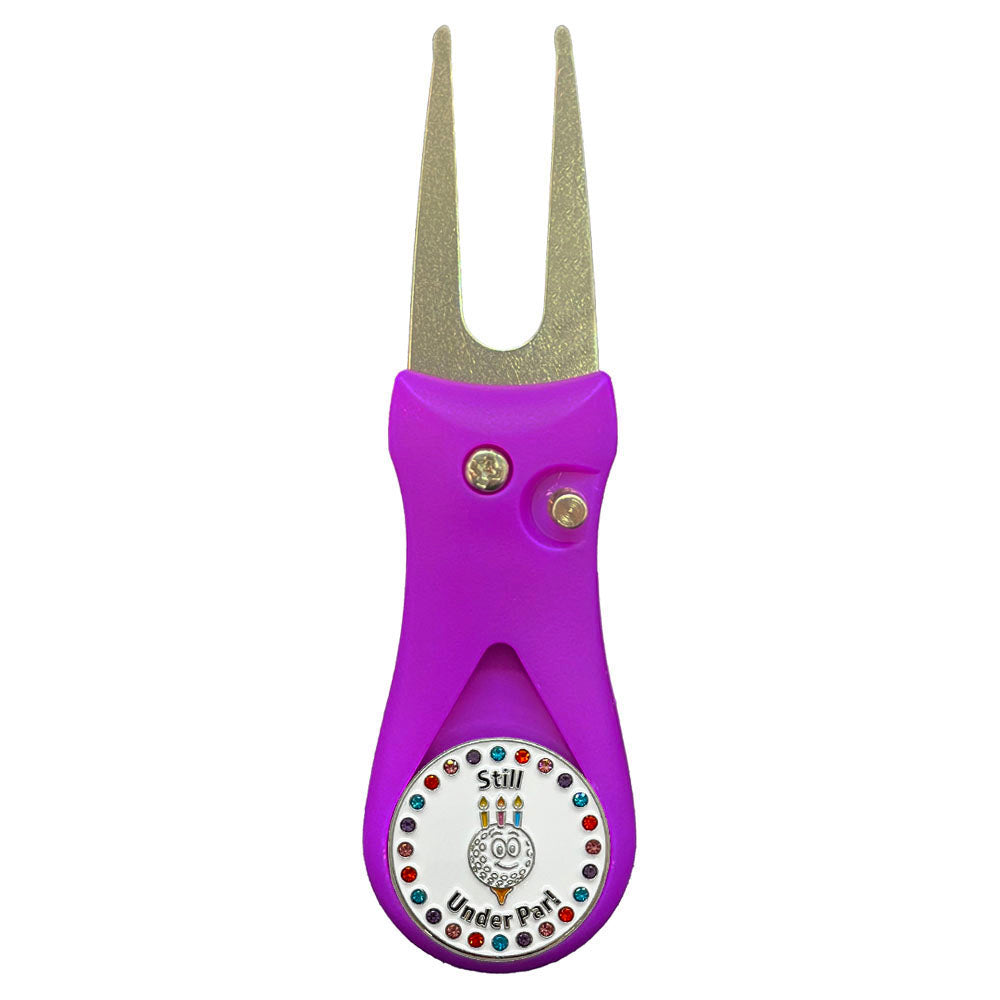 Purple golf divot tool with a colorful birthday ball marker on a white background