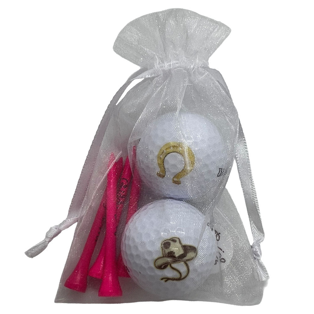 Western golf ball and tees set featuring western-themed design. Includes 2 golf balls and 4 pink tees, perfect for women golfers