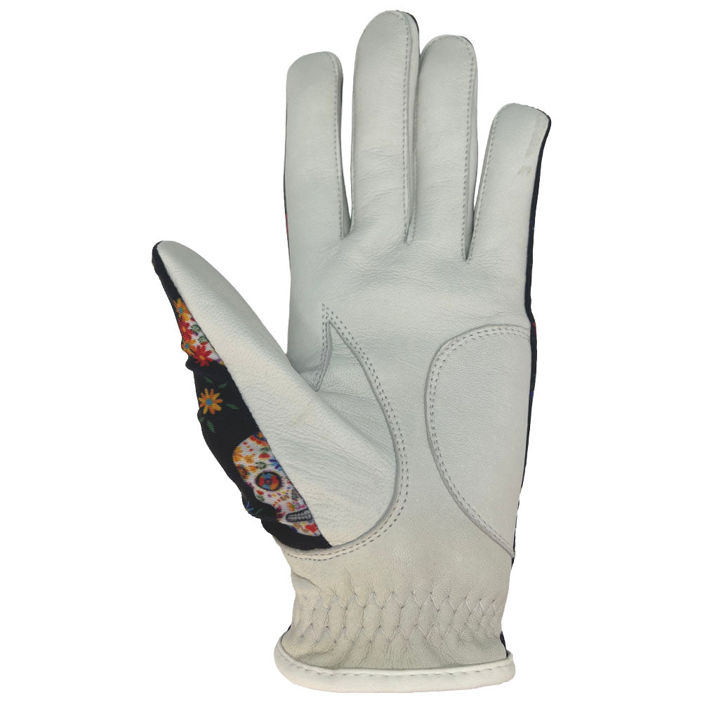 Women's colorful sugar skull golf glove with white palm. Worn on left hand.