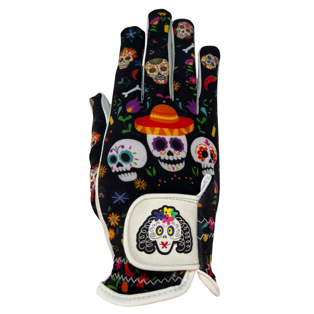 Women's black golf glove with colorful sugar skull design on a white background. Worn on right hand.