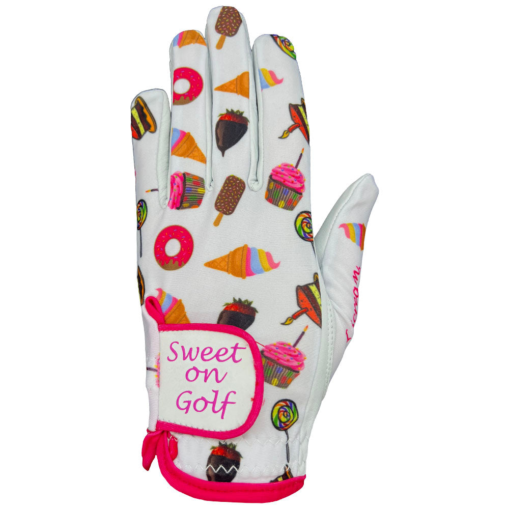 Women's golf glove with candy-themed design and 'Sweet on Golf' text on a white background. Worn on left hand.