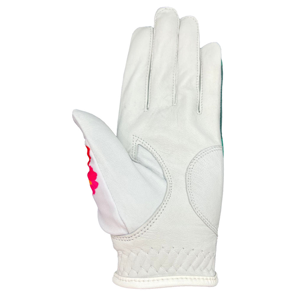 Tropical women's golf glove with white palm. Worn on left hand.