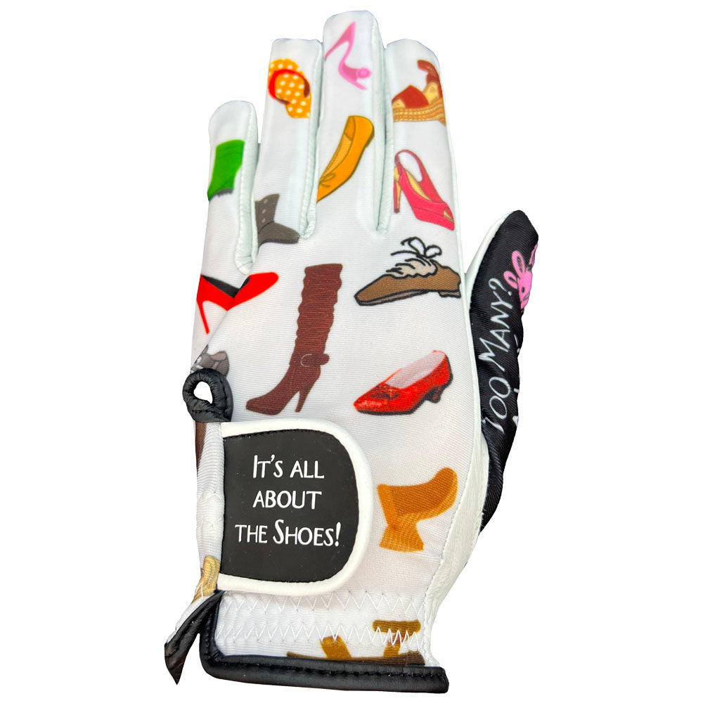 Women's it's all about the shoes golf glove, with black trim, on a white background. Worn on left hand.