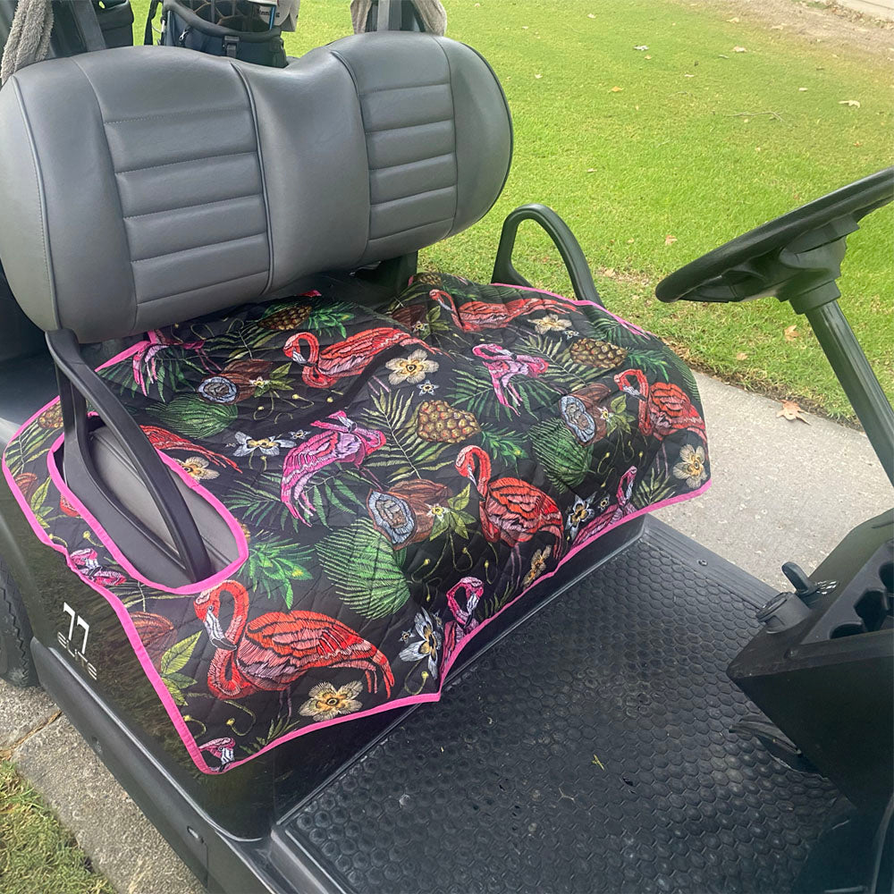 Tropical flamingo print golf cart seat blanket and cover installed on a cart seat.