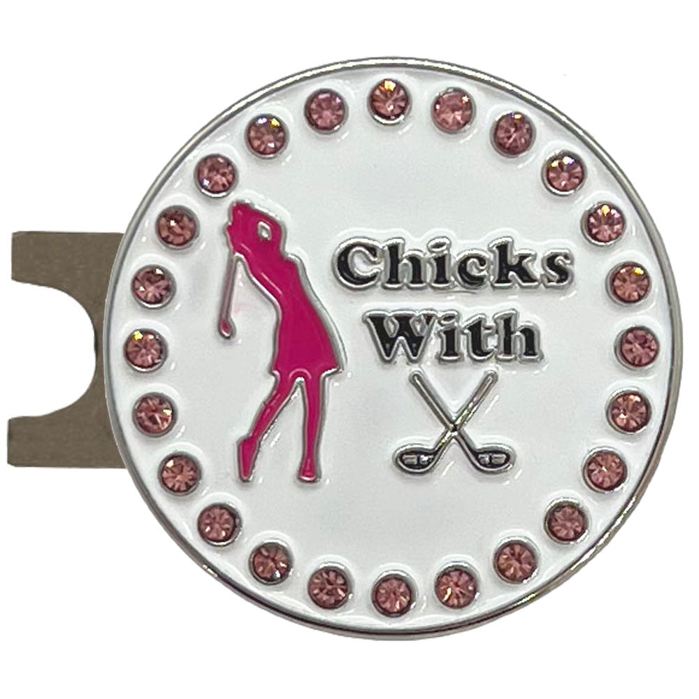 Golf ball marker with pink silhouette of a golfer and 'Chicks With (Crossed Clubs)'  text on a magnetic hat clip, on a white background