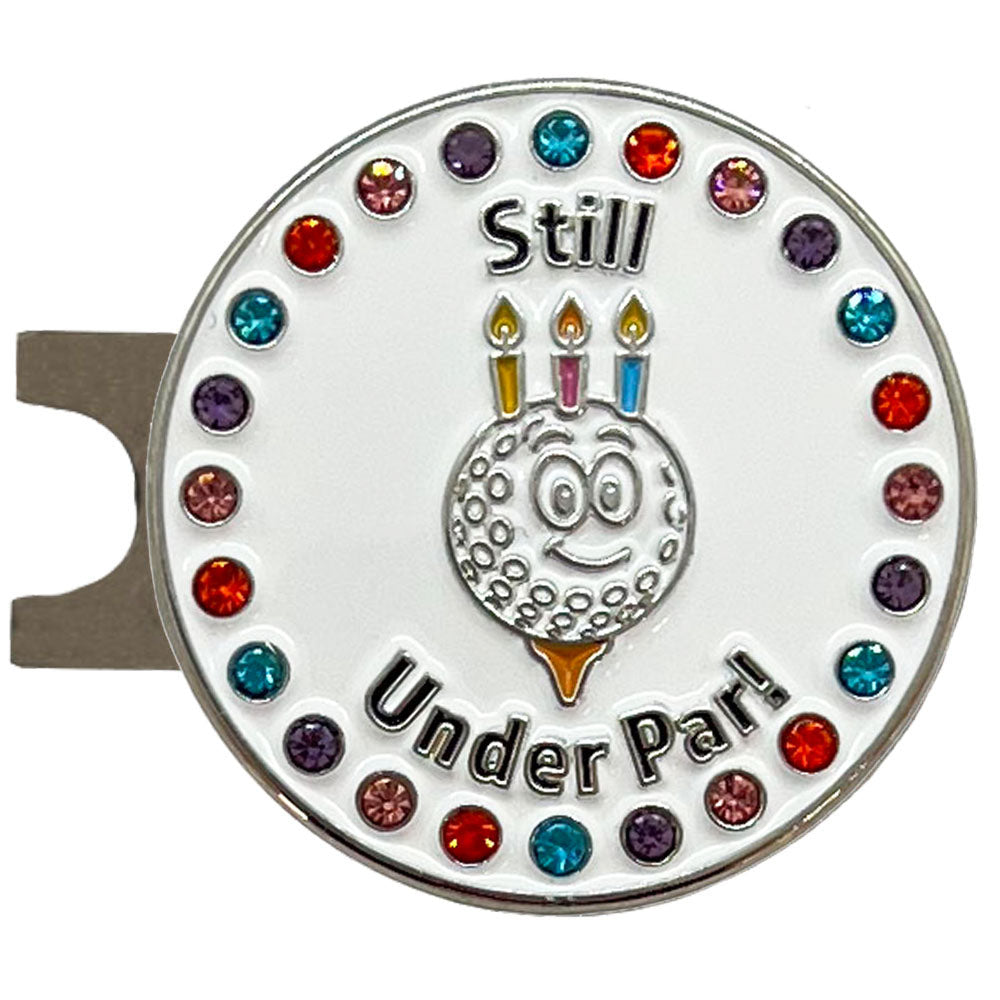 Golf hat clip ball marker with colorful crystals and 'Still Under Par' text on a white background