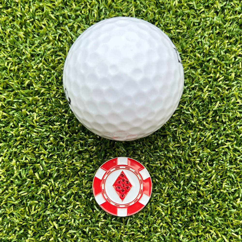 Glittery red‑and‑white poker chip golf ball marker with red diamond center