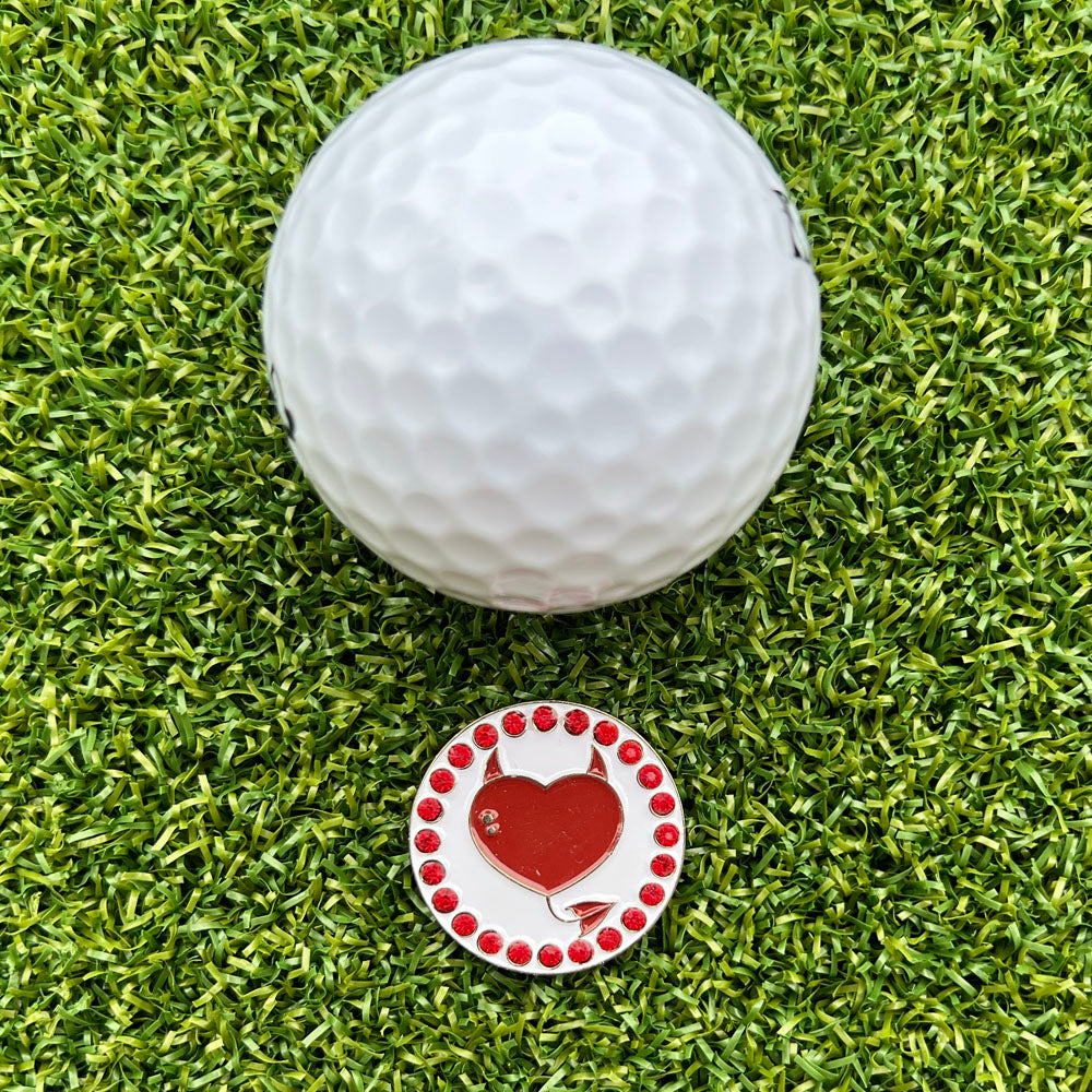 Sparkly red devil horns-shaped golf ball marker