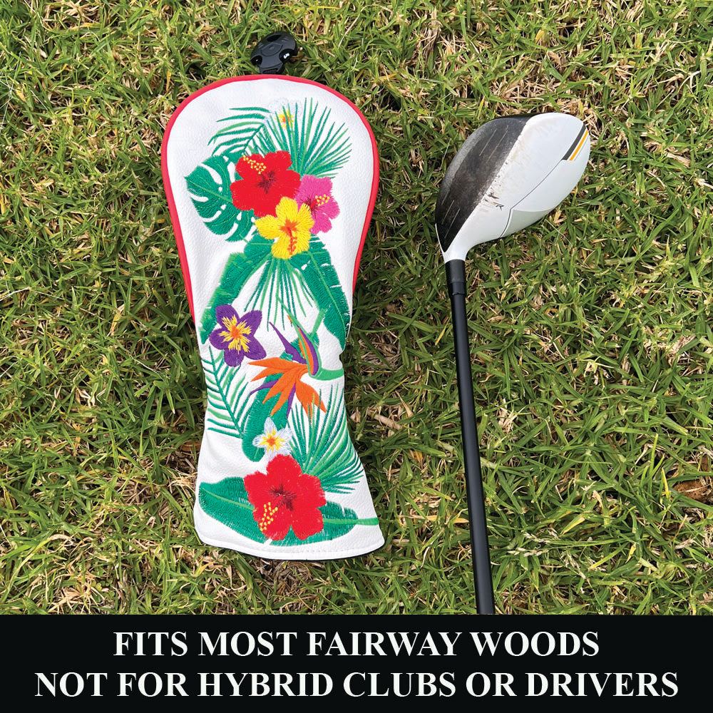 Golf club with a colorful tropical floral fairway head cover on grass