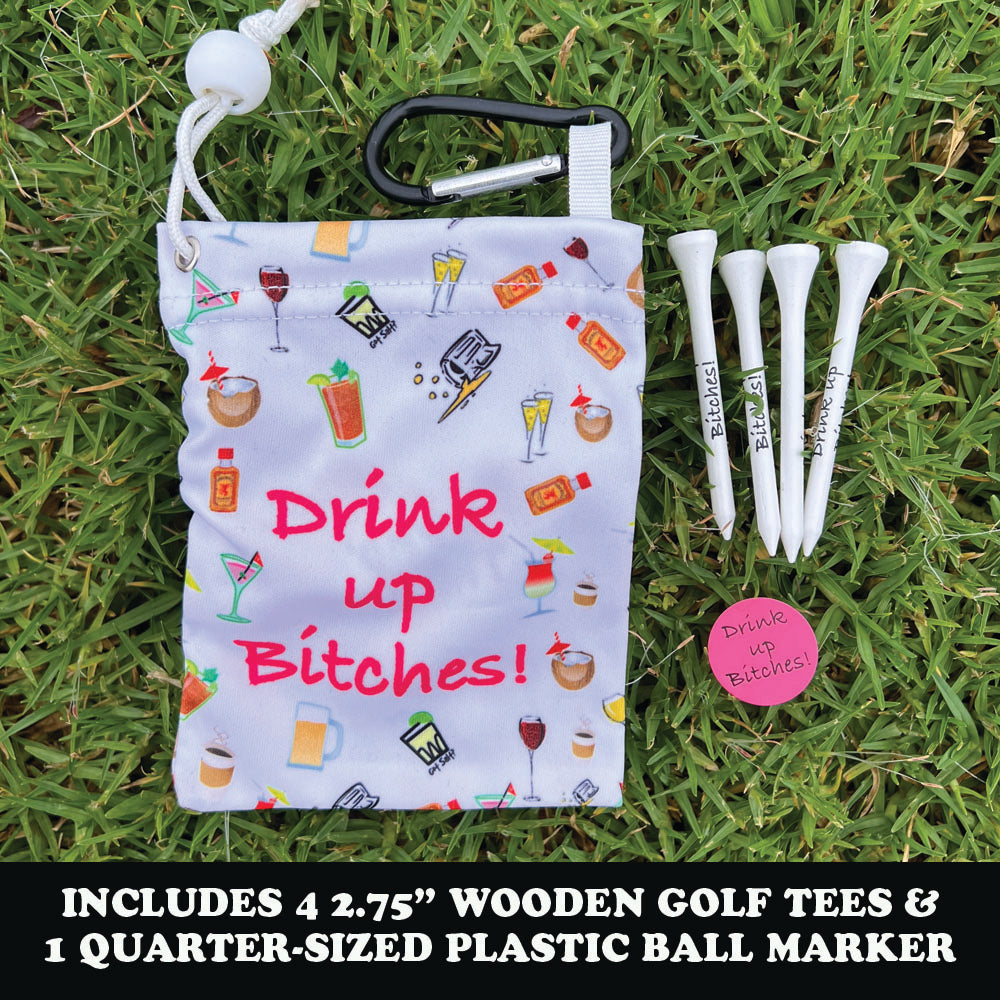 Golf accessories set with a drinks themed bag, golf tees, and ball marker on grass