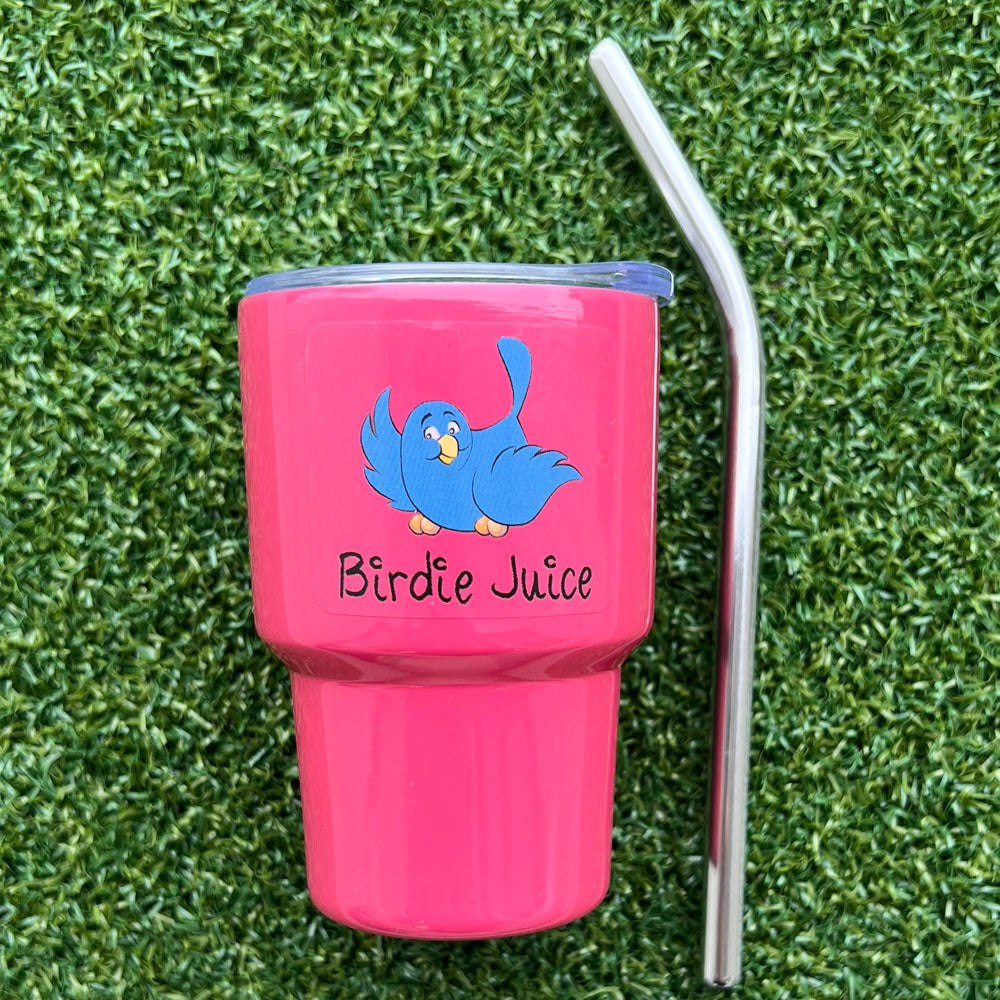 Pink golf mini tumbler with blue bird design and 'Birdie Juice' text on grass - bright set