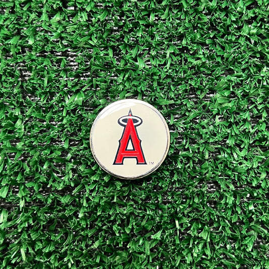 Los Angeles Angels golf ball marker on green – clearance accessory