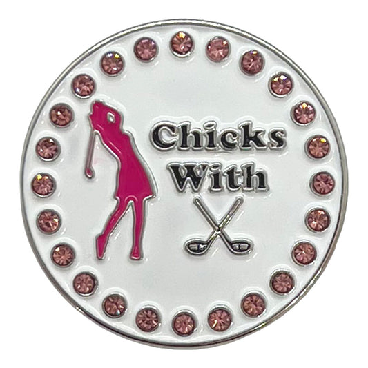 Golf ball marker with pink silhouette of a female golfer and text 'Chicks With (Crossed Clubs Icon)' on a white background.