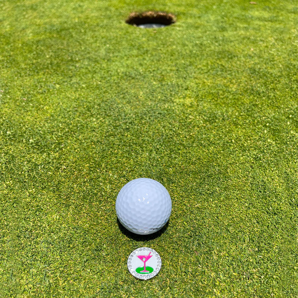Giggle Golf Bling 19th Hole Ball Marker On Putting Green, Behind A Golf Ball