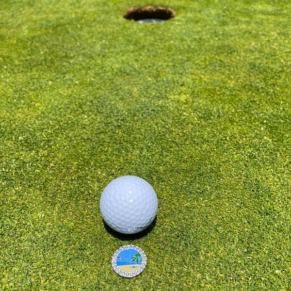 Giggle Golf Bling Beach Scene Ball Marker On Putting Green, Behind A Golf Ball