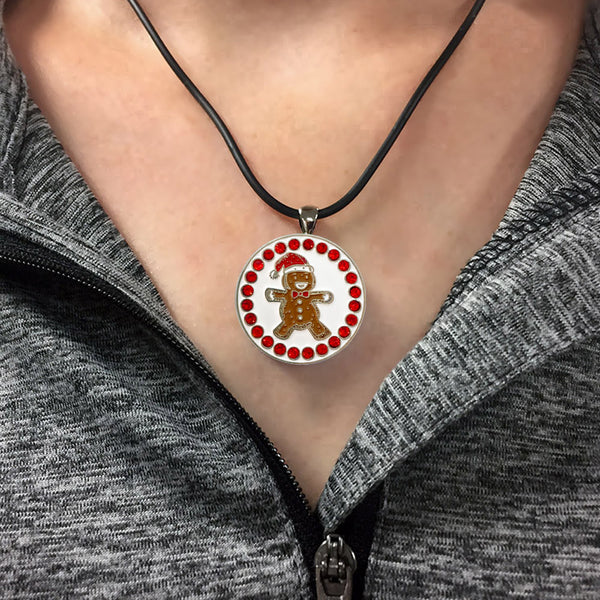A Woman Wearing The Giggle Golf Bling Gingerbread Man Ball Marker Necklace