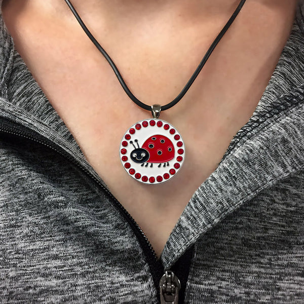 A Woman Wearing The Giggle Golf Bling Ladybug Ball Marker Necklace
