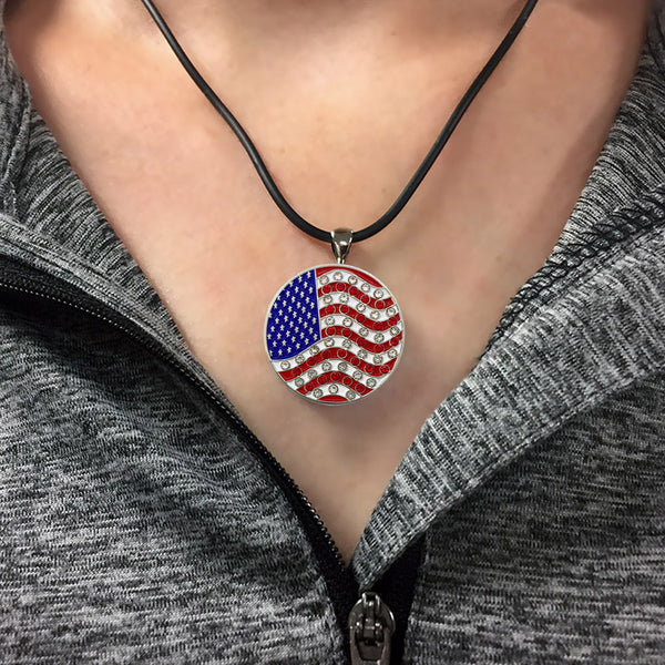 A Woman Wearing The Giggle Golf Bling USA Flag Ball Marker Necklace