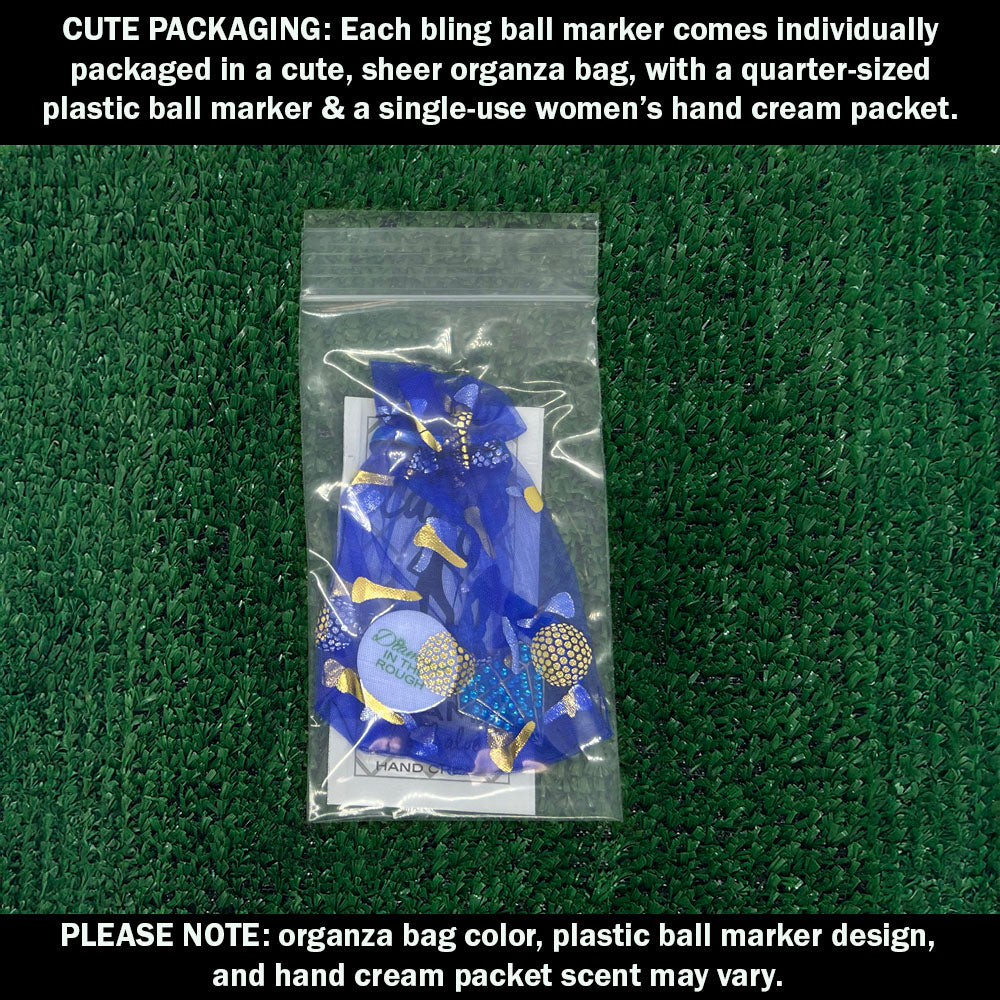 Cute packaging with bling blue diamond ball marker and hand cream packet on a green background