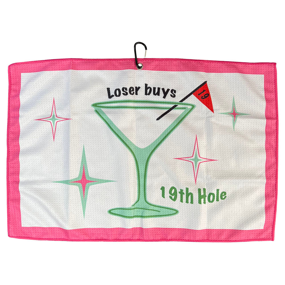Golf towel with an empty martini glass design and text that says 'Loser buys'  on a white background
