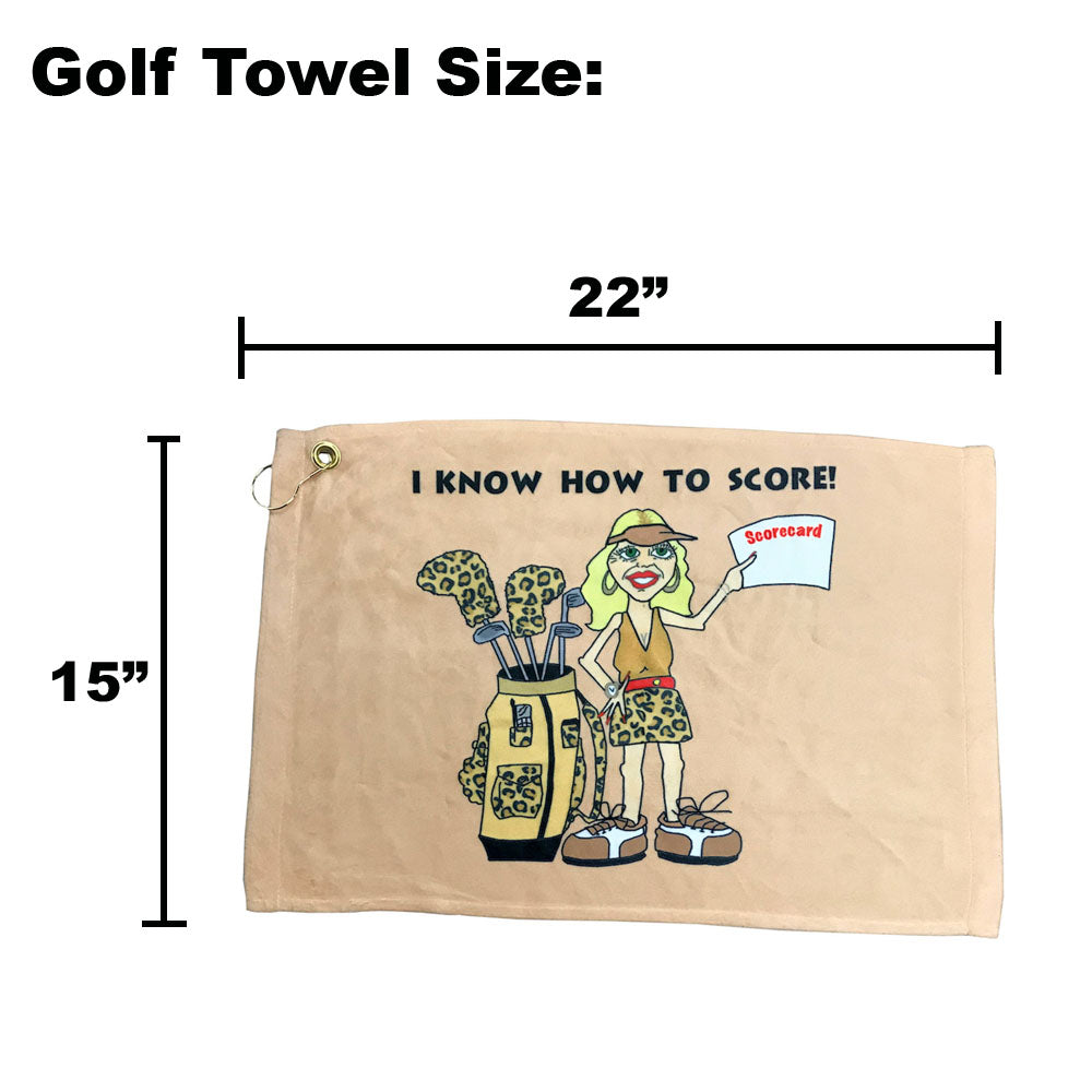 Golf towel with cartoon design and text 'I know how to score!' displayed with measurements on a white background.
