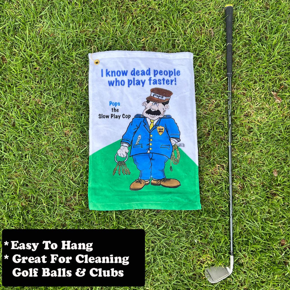 funny golf cop towel design next to a golf club on grass