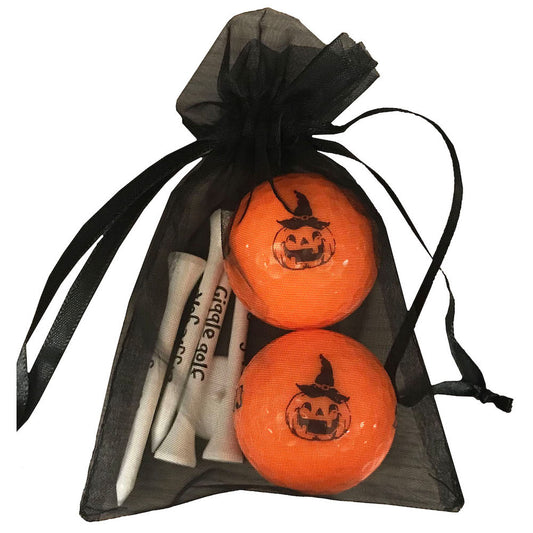 orange pumpkin nike mojo golf balls with four wooden golf tees