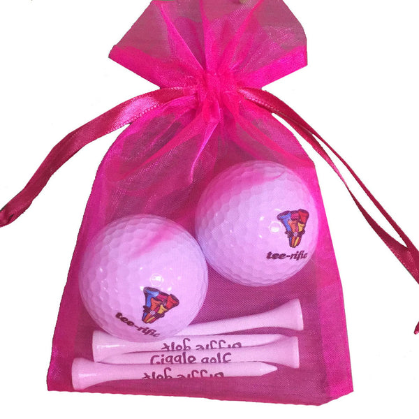 tee-rific golf balls with four wooden golf tees