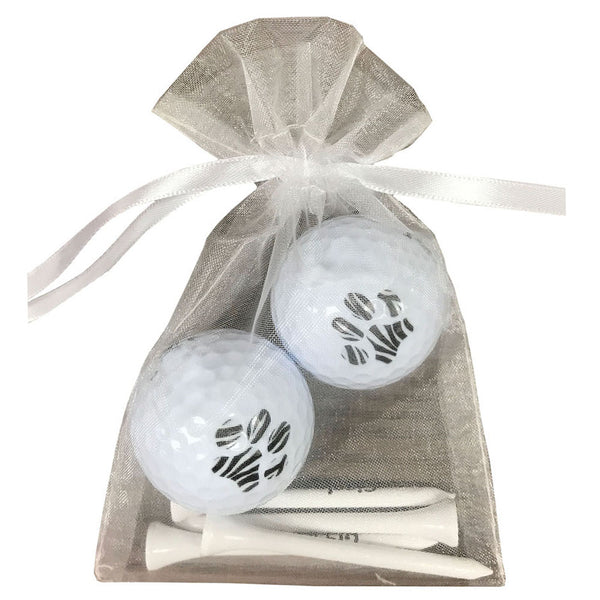 zebra print golf balls with four wooden golf tees