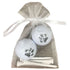 zebra print golf balls with four wooden golf tees
