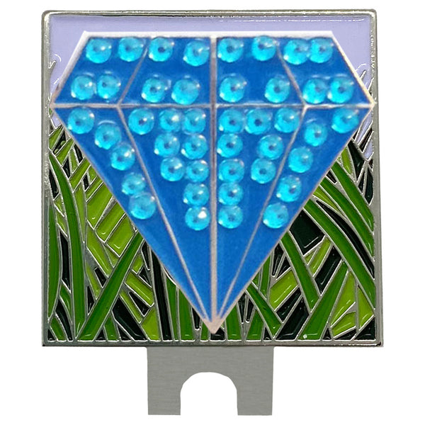 bling blue diamond shaped golf ball marker on a rough (grass) hat clip