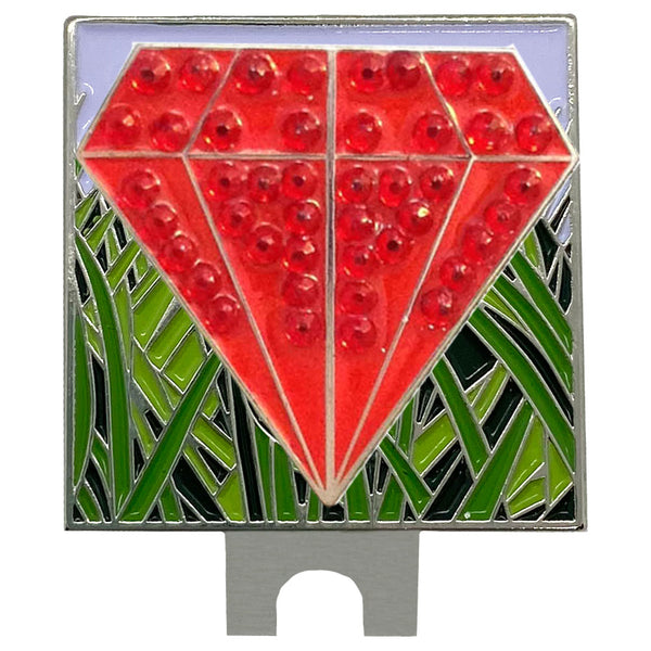 bling red diamond shaped golf ball marker on a rough (grass) hat clip