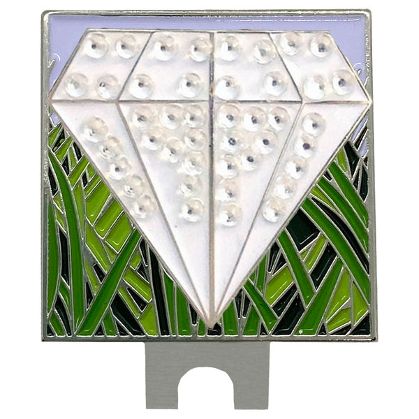 bling white diamond shaped golf ball marker on a rough (grass) hat clip