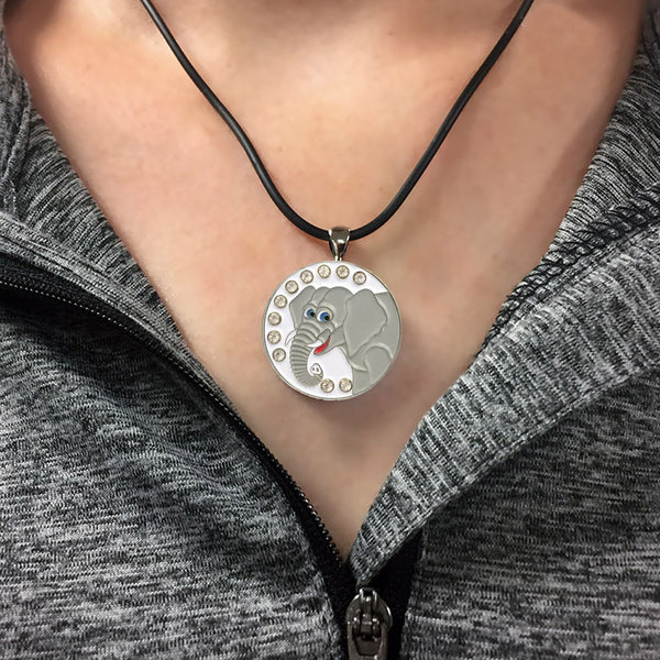 a woman wearing a bling grey elephant golf ball marker necklace