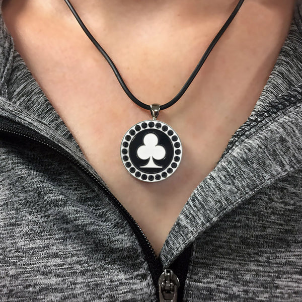 a woman wearing the bling black & white poker club golf ball marker necklace
